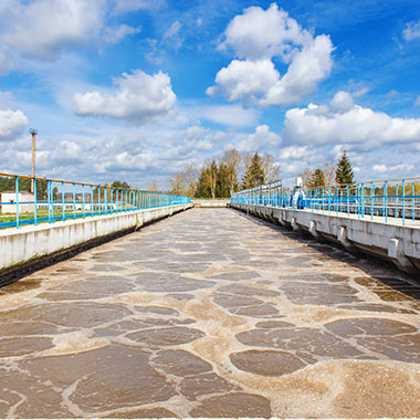 An aeration basin at a water treatment plant activates the biological sludge process. Water high in alkalinity present in dissolved minerals affect bacteria needed for digestion.